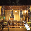 JMEXSUSS 600 LED Christmas Curtain Lights Outdoor, 9.5x19.6ft Christmas String Light Plug in with Remote, 8 Modes Wall Hanging Lights for Bedroom Party Backdrop Wedding Xmas Decor, Warm White